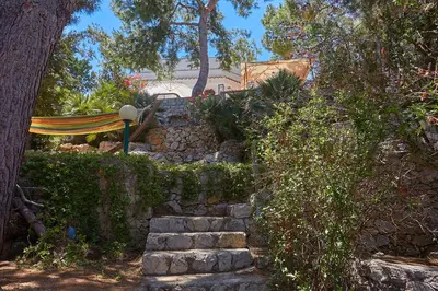 a set of stone steps leading up to a house at Villa Gabry in Bagheria