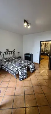 a bedroom with a bed in a room at Virginia House in Palermo