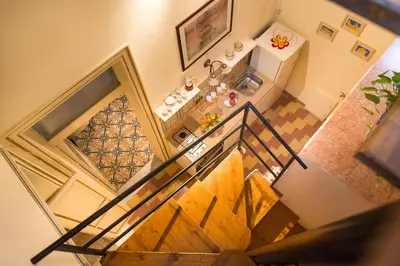 an overhead view of a staircase in a house at Casa d'arte Ugdulena con Piscina e Terrazza by Wonderful Italy in Palermo