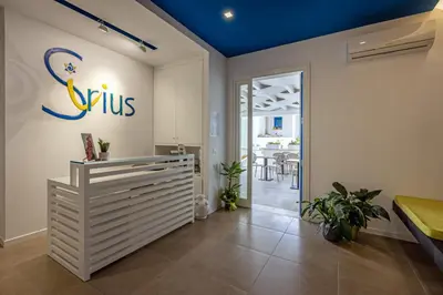 a room with a clinic sign on the wall at Affittacamere Sirius in San Vito lo Capo