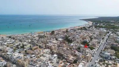 an aerial view of a city and the beach at Casa Lisa a due passi dal mare con ampio giardino in San Vito lo Capo