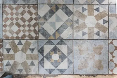 a close up of a tile floor in a bathroom at L' Arena Suite - Sicilian style 140 mq flat with balcony and Arena seeview in Castellammare del Golfo