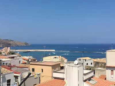 a view of the ocean from the roofs of buildings at Mare e Relax in Castellammare del Golfo
