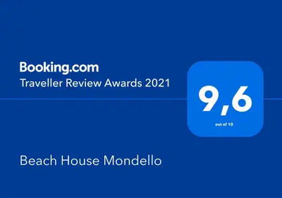 a screenshot of a beeper with a beach house mondello at Beach House Mondello in Mondello