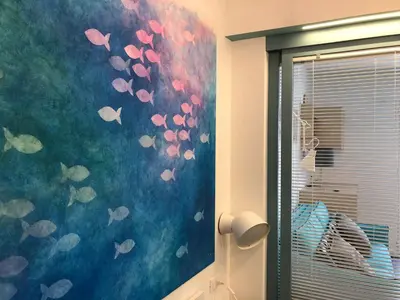 a room with a painting of butterflies on the wall at Mizzika Vacanze in Castellammare del Golfo