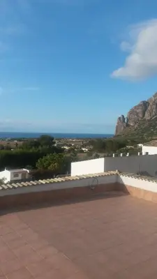 a view of the ocean from the roof of a building at Villa Cloe in San Vito lo Capo