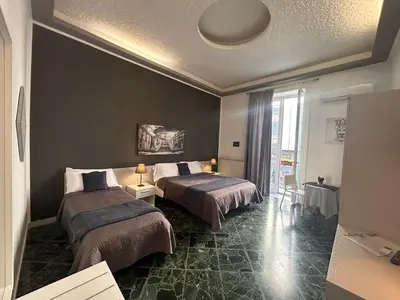 a hotel room with two beds in a room at Amarillo in Palermo