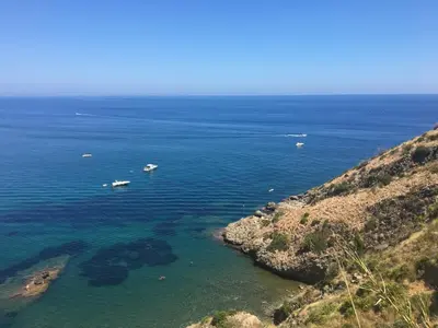 an aerial view of a large body of water with boats at Villino Giulia in Altavilla Milicia
