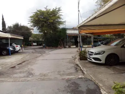 a white car parked on the side of a street at All'Ombra di Porta Nuova in Palermo