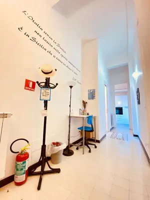 a room with a wall with writing on it at Mamamia #Teatro Massimo in Palermo