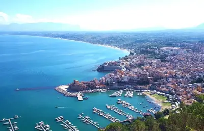 an aerial view of a harbor with boats in the water at Villette di Scopello - Casa Vacanze in Scopello