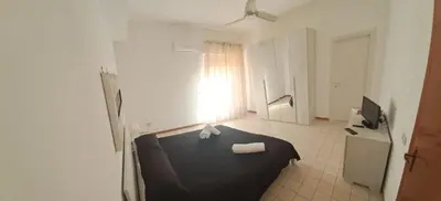 a room with a black table and a window at Apartments Bed Abate in Villabate