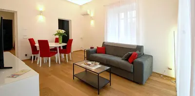 a living room with a couch and a table at Maqueda331 in Palermo