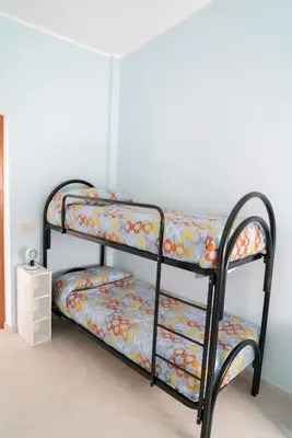 two bunk beds in a room at Villa Claudia e Simone in Carini