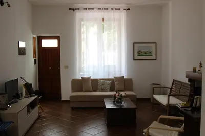 a living room with a couch and a table at Da Sophie in Mondello