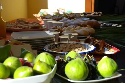 a table topped with plates of food and other foods at Al Cantuccio in Castelluzzo
