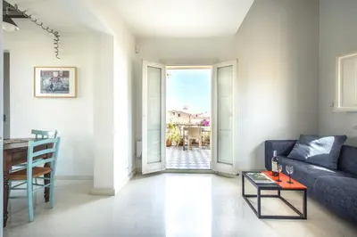 a living room with a couch and a table at Palazzo Castrofilippo Apartment by Wonderful Italy in Palermo