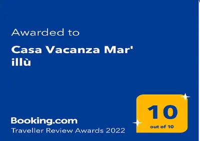 a yellow sign with the text awarded to casa vazaanca mar lift at Casa Vacanza Mar' illù in Castellammare del Golfo