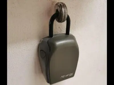 a black object is hanging on a wall at Il Rifugio in Palermo