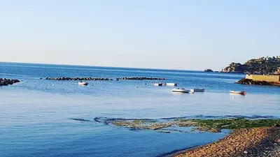 a large body of water with boats in it at Sea Room Aspra in Bagheria