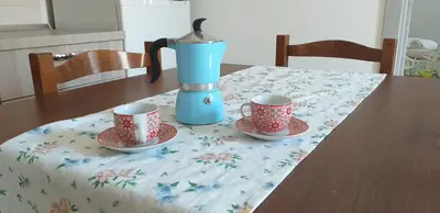 a table with two cups and a blender on a table at Duchessa in Castellammare del Golfo
