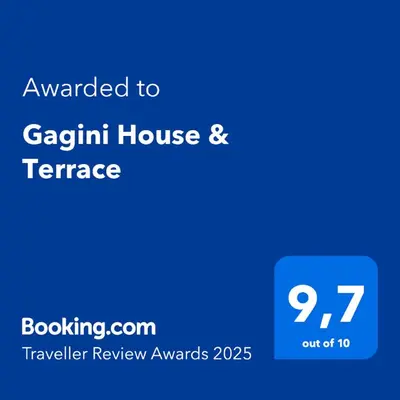 a blue sign with the text awarded to gerald house and terrace at Gagini House & Terrace in Palermo