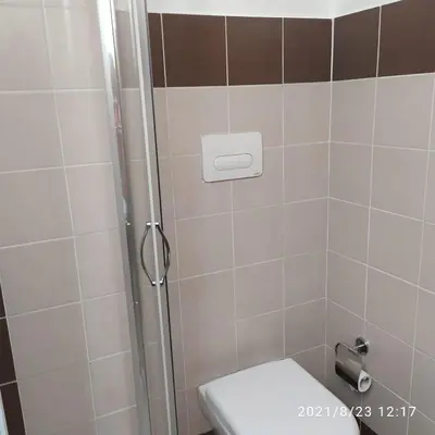 a bathroom with a shower with a toilet in it at STONE HOUSE e Casa Vacanze Zia Rosina in Montemaggiore Belsito