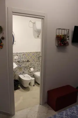 a bathroom with a toilet and a bidet at cocciu d'amuri in Caccamo