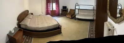 a bedroom with a bed and a mirror at Arco di ballarò in Palermo