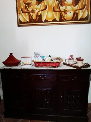 a table with some cupcakes on top of it at OrangeBalestrate in Balestrate