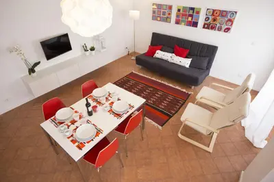 an overhead view of a living room with a table and chairs at GIULIA E CHIARA LUXURY APARTMENT in Castellammare del Golfo