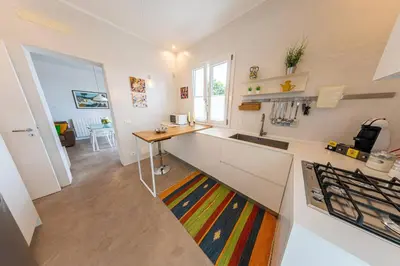 a kitchen with a sink and a counter top at Villa Nico in Casteldaccia