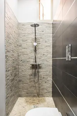 a bathroom with a shower with a toilet at Casa marty in Mondello