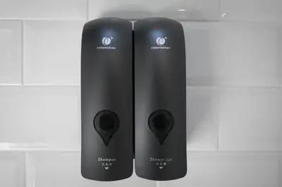 two black wii controllers are standing next to each other at Addimora Boutique Suites in Palermo