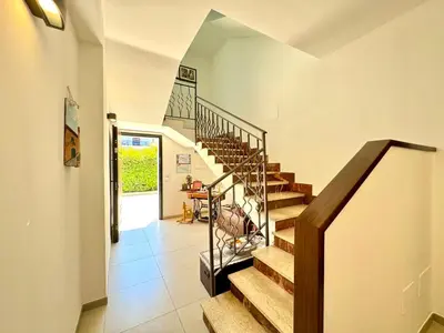 a staircase in a home with a hallway at Casa di Mami in Capaci