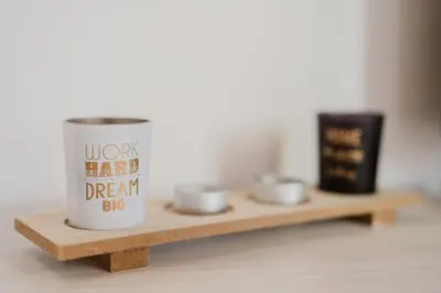 a coffee cup sitting on a wooden shelf at Costa del Golfo in Castellammare del Golfo