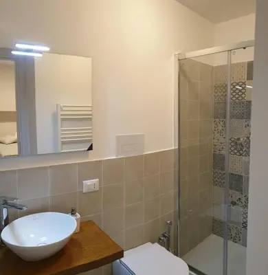 a bathroom with a sink and a shower at Casa Margò in Monreale