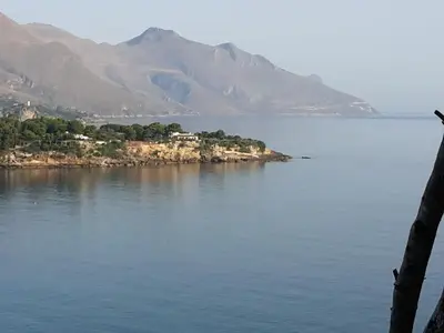 a small island in the middle of a body of water at Casa Lidia in Castellammare del Golfo