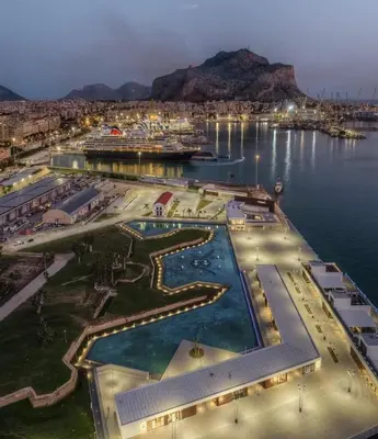 an aerial view of a marina at night at Calalula Apartment Palermo in Palermo
