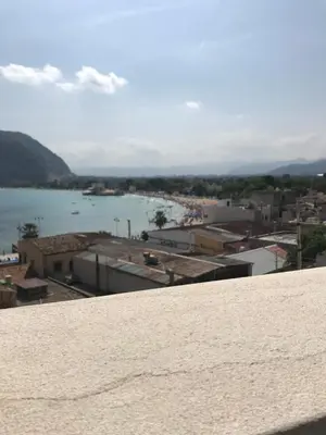 a view of a city and a body of water at Casa Nicolina in Palermo