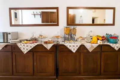 a kitchen with a counter with fruits on it at B&B Addauru in Palermo