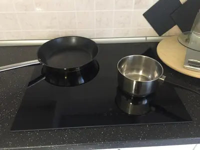 a pair of pots and pans sitting on top of a stove at Casa Mia in Altavilla Milicia