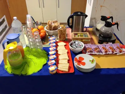 a table with sandwiches and other food on it at Costapicca in Alcamo