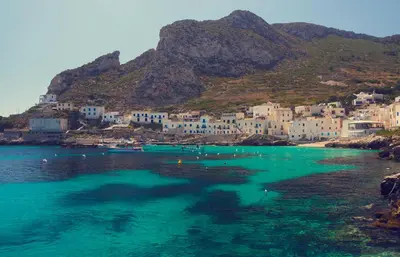a view of a beach with buildings and the water at Bed & Breakfast Tiziana in Castellammare del Golfo