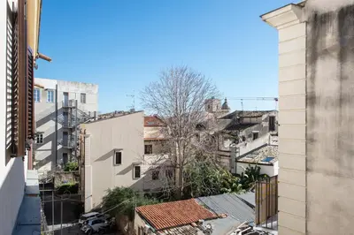 an overhead view of a city with buildings at Conte Federico Apartments in Palermo