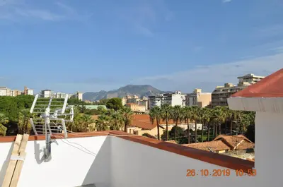 a view of a city from the roof of a building at Casa Rosina in Palermo
