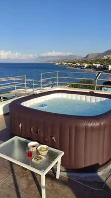 a hot tub on the deck of a cruise ship at Villa Francesca 30 Pax by Ville in Palermo in Casteldaccia