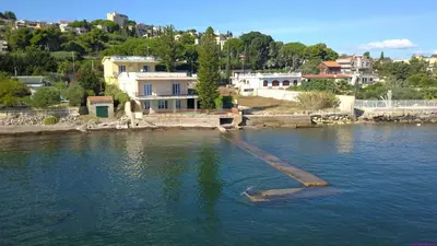 a large body of water with houses and buildings at Appartamento 8 Pax in Villa Francesca by Ville in Palermo in Casteldaccia