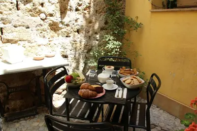 a black table with food on top of it at Khalisah in Palermo
