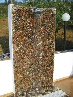 a wall made out of rocks and gravel at Egesta, villa with private pool in Calatafimi